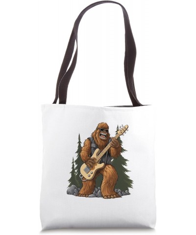 Bigfoot Playing an Electric Guitar Tote Bag $15.26 Totes