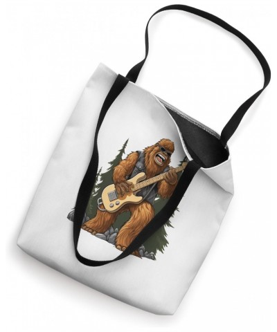 Bigfoot Playing an Electric Guitar Tote Bag $15.26 Totes