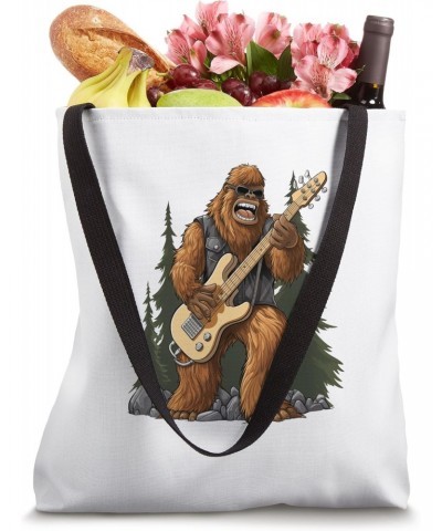 Bigfoot Playing an Electric Guitar Tote Bag $15.26 Totes